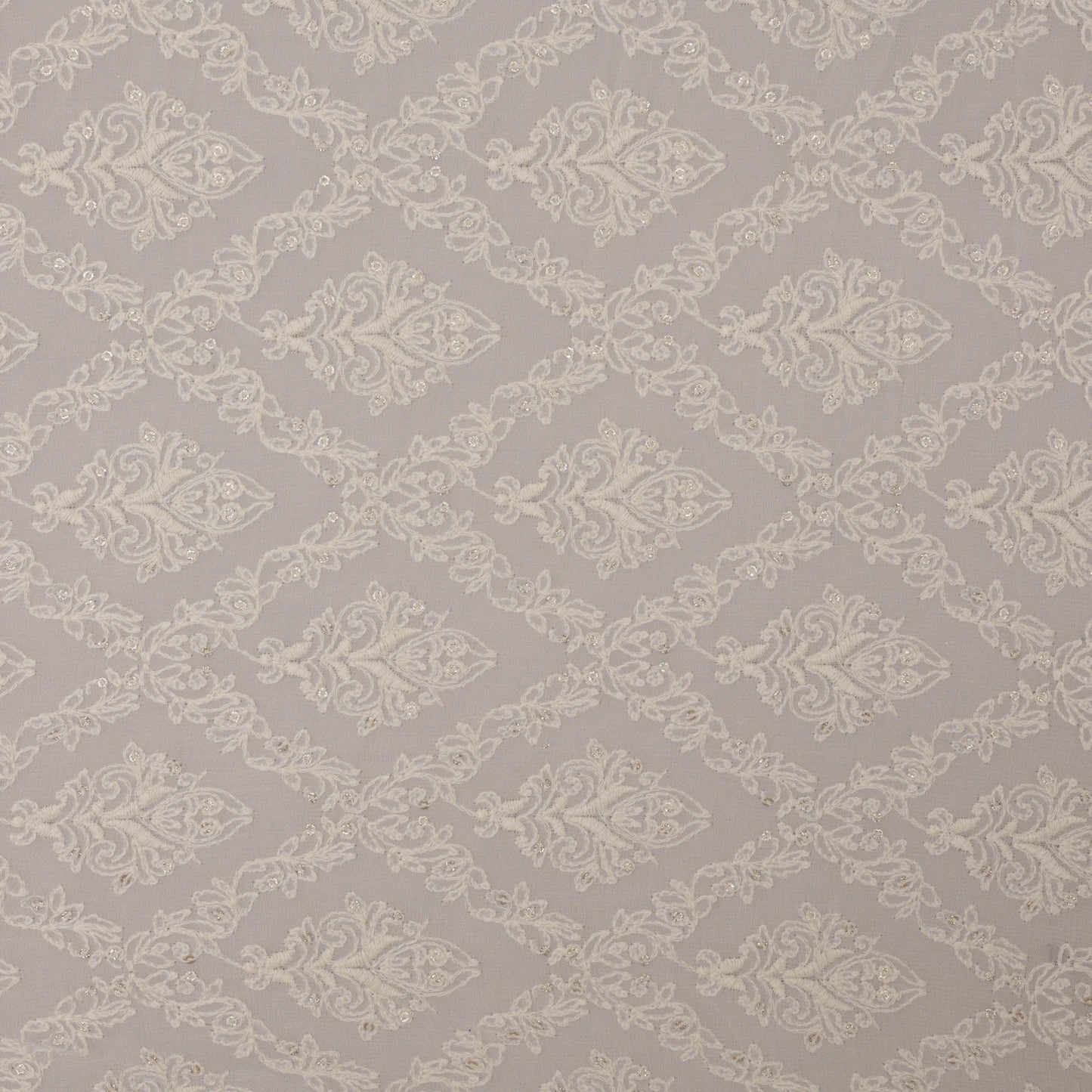 White Color Georgette Embroidery Fabric.