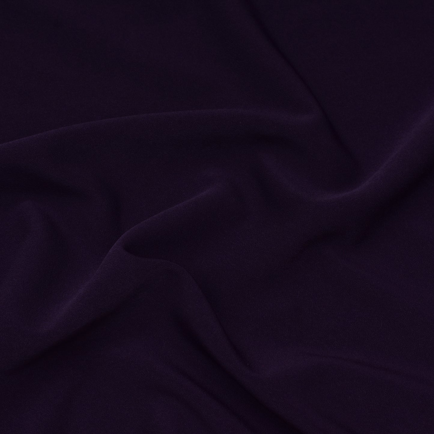 Dark Purple Color Solid Banana Crepe Fabric