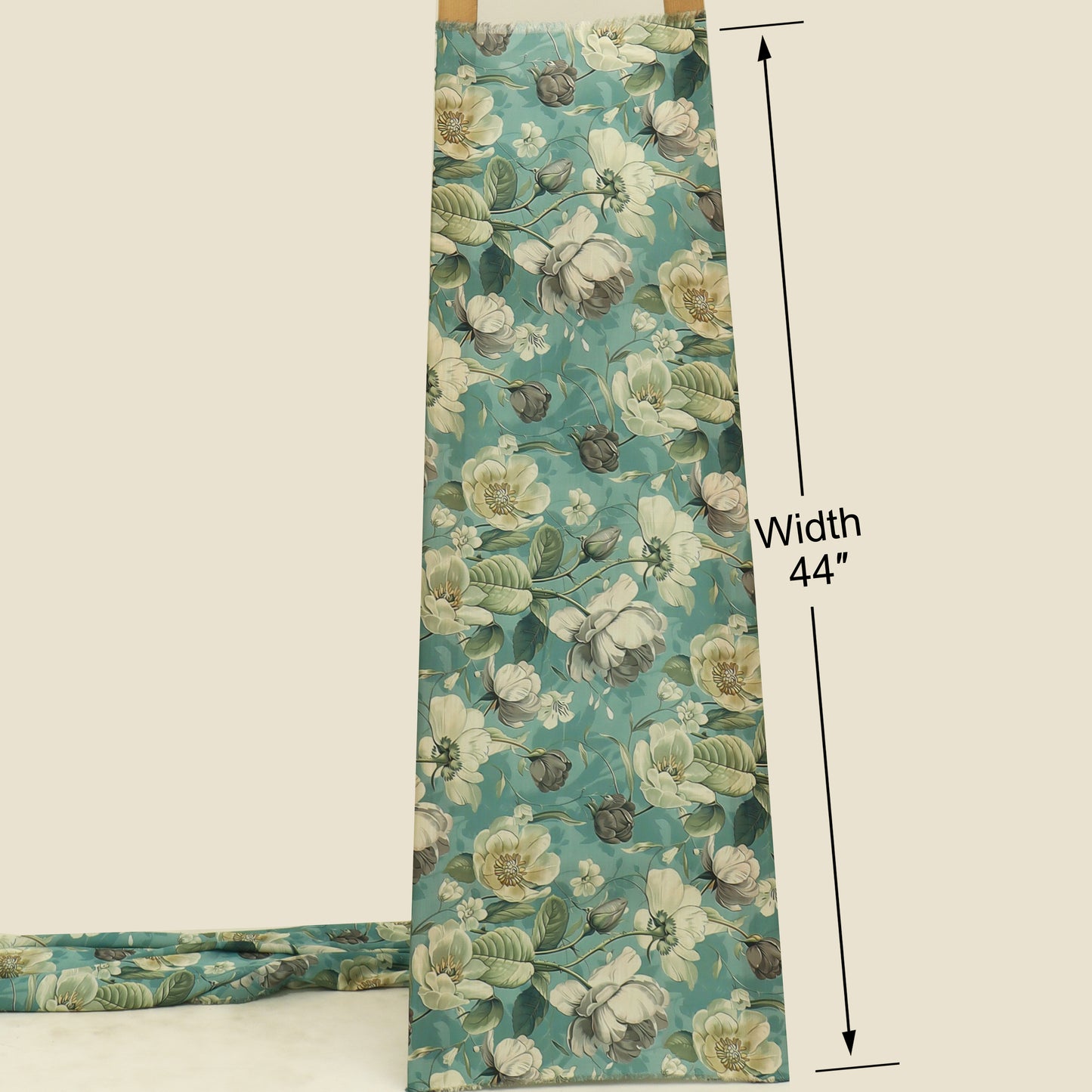 A floral fabric panel or curtain shown hanging vertically with a width measurement annotation reading 44 inches. The fabric has a teal background with large cream, white, and muted green floral print.