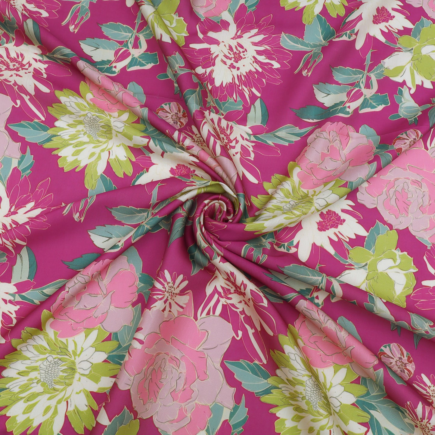 A close-up of draped fabric with a bright pink floral print, featuring large white and pink flowers with green and lime leaves, arranged in a spiral drape.
