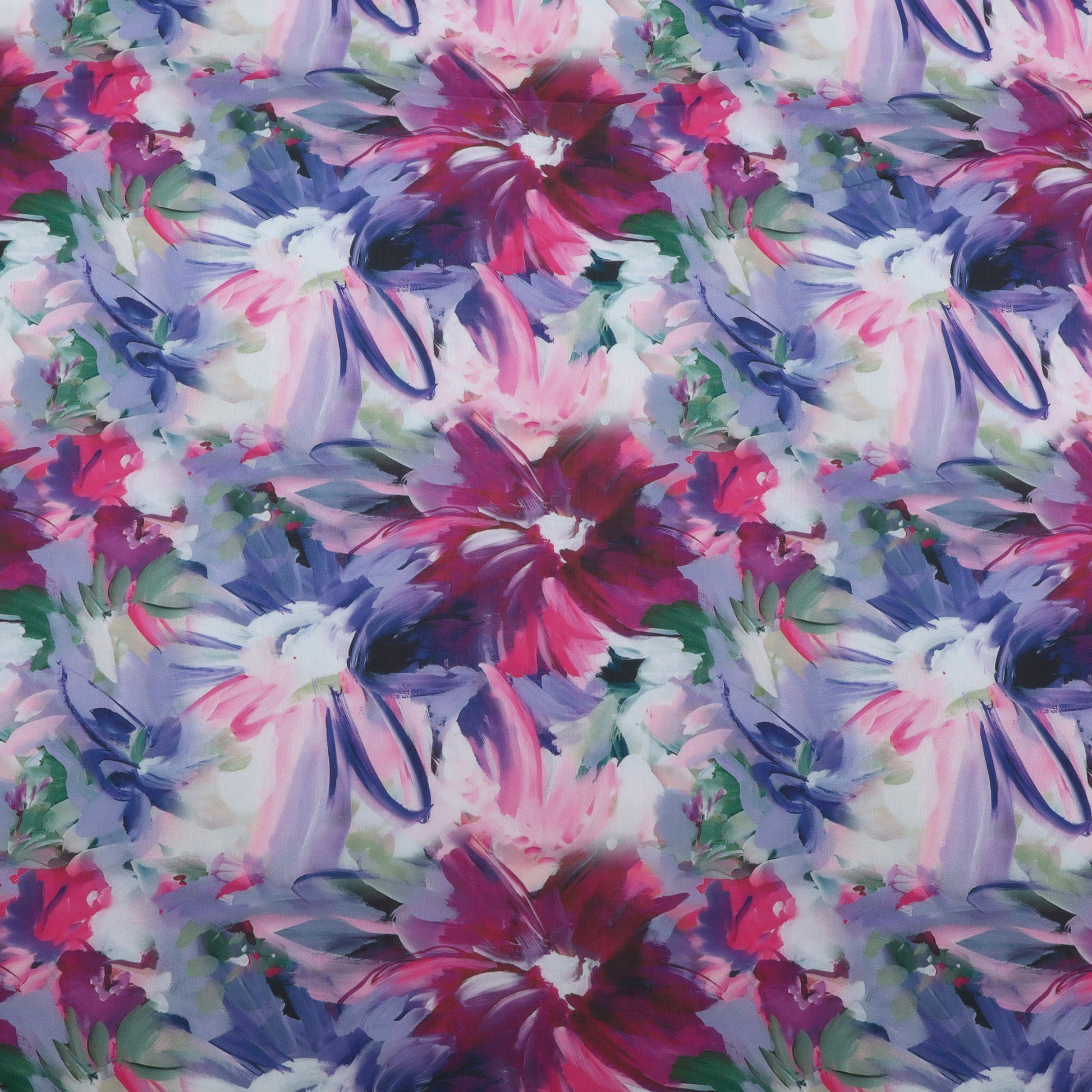 A close-up of a floral fabric pattern featuring large watercolor-style flowers in pink, purple, blue, and green on a white background.