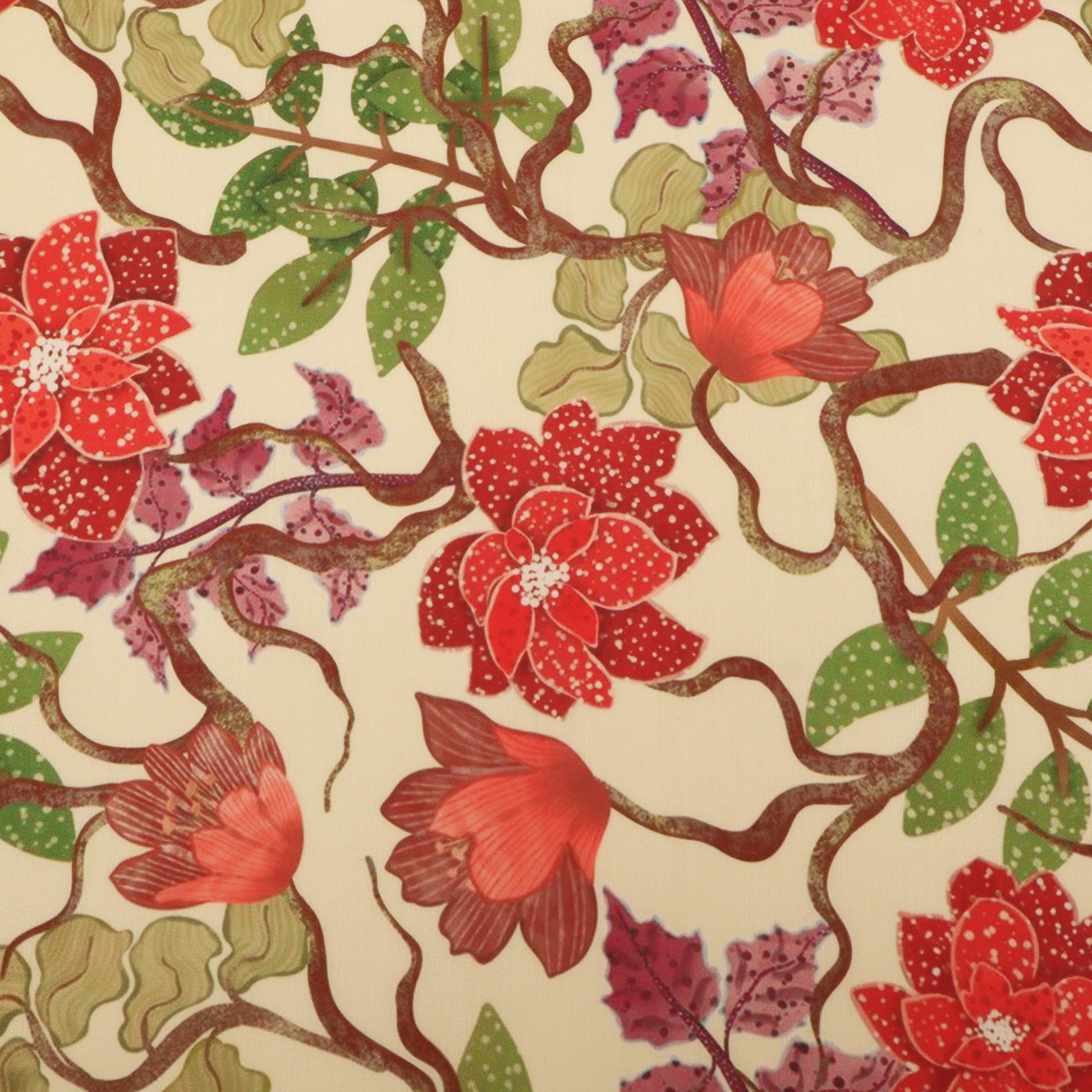 A close-up of a floral patterned fabric or wallpaper featuring red and pink flowers, green leaves, and brown twisting vines on a warm cream background.