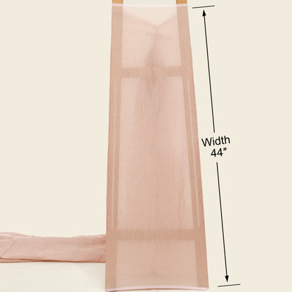 Beige fabric with a measurement label indicating width 44 inches on a beige background