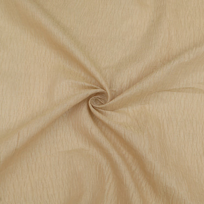 Beige fabric swatch with a swirl pattern