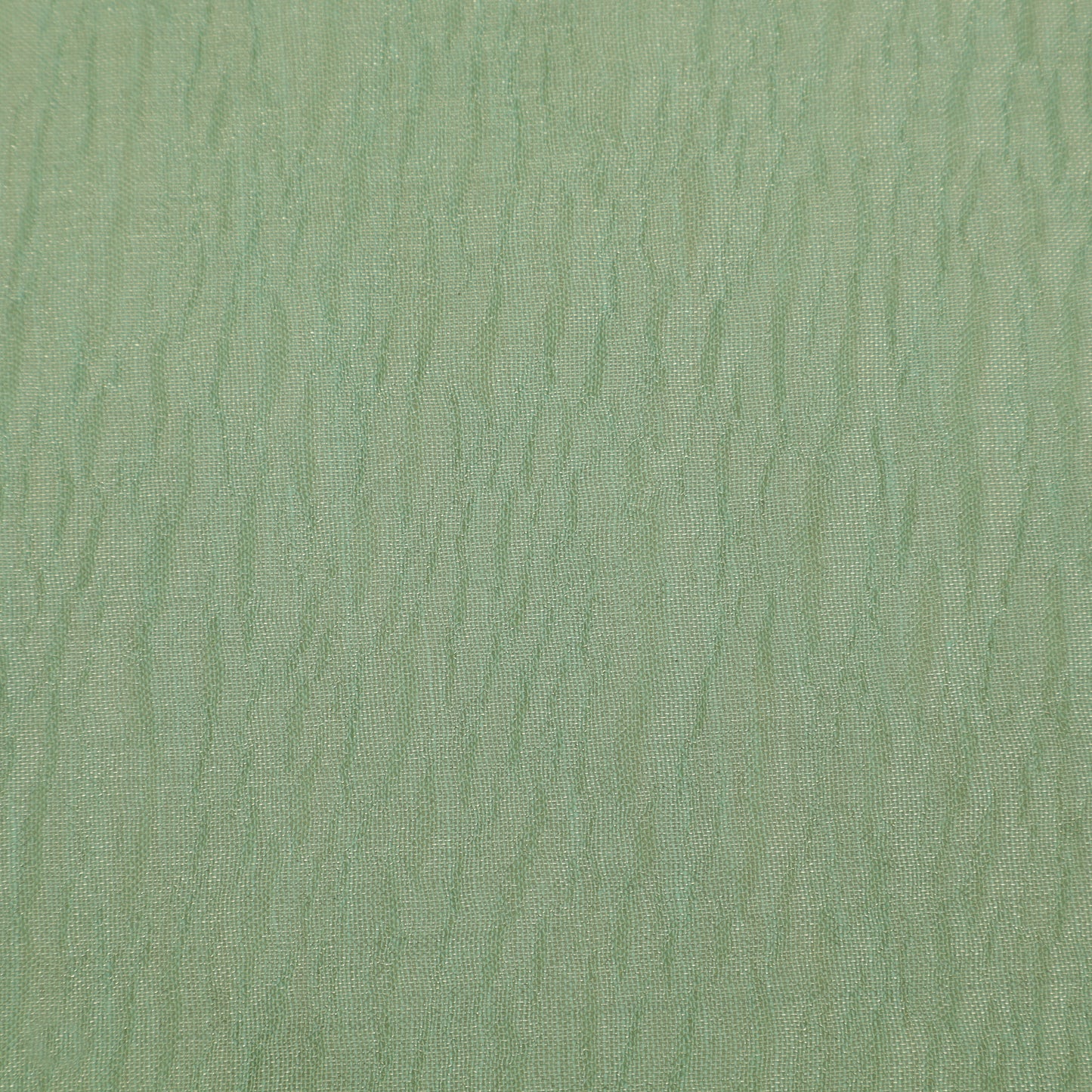 Solid green color swatch with a textured pattern