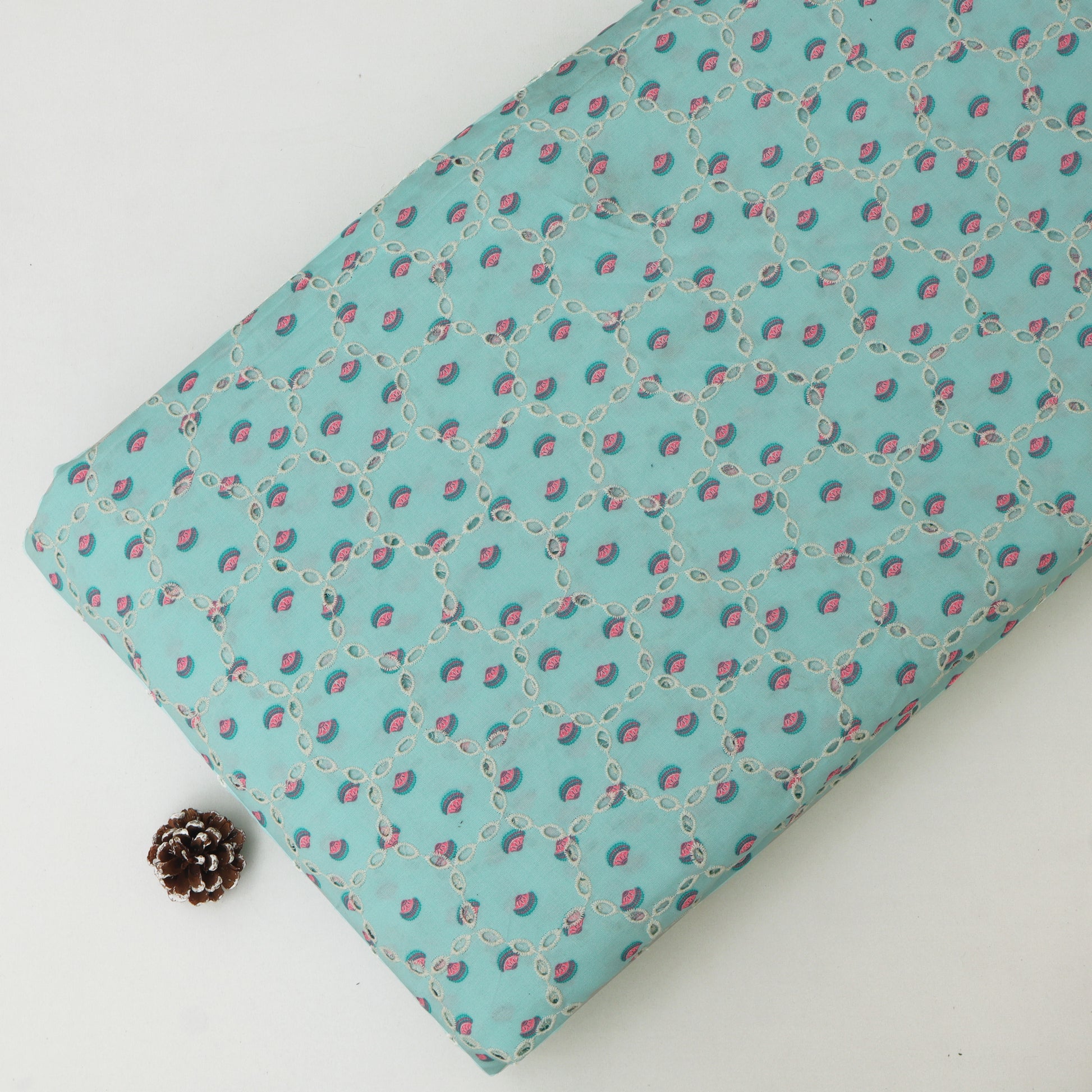 Fabric with a floral pattern on a light blue background
