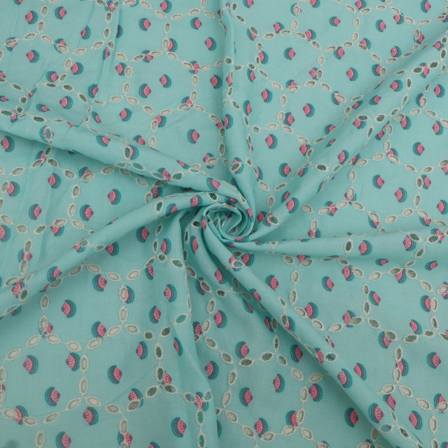 Turquoise fabric with small pink and green pattern