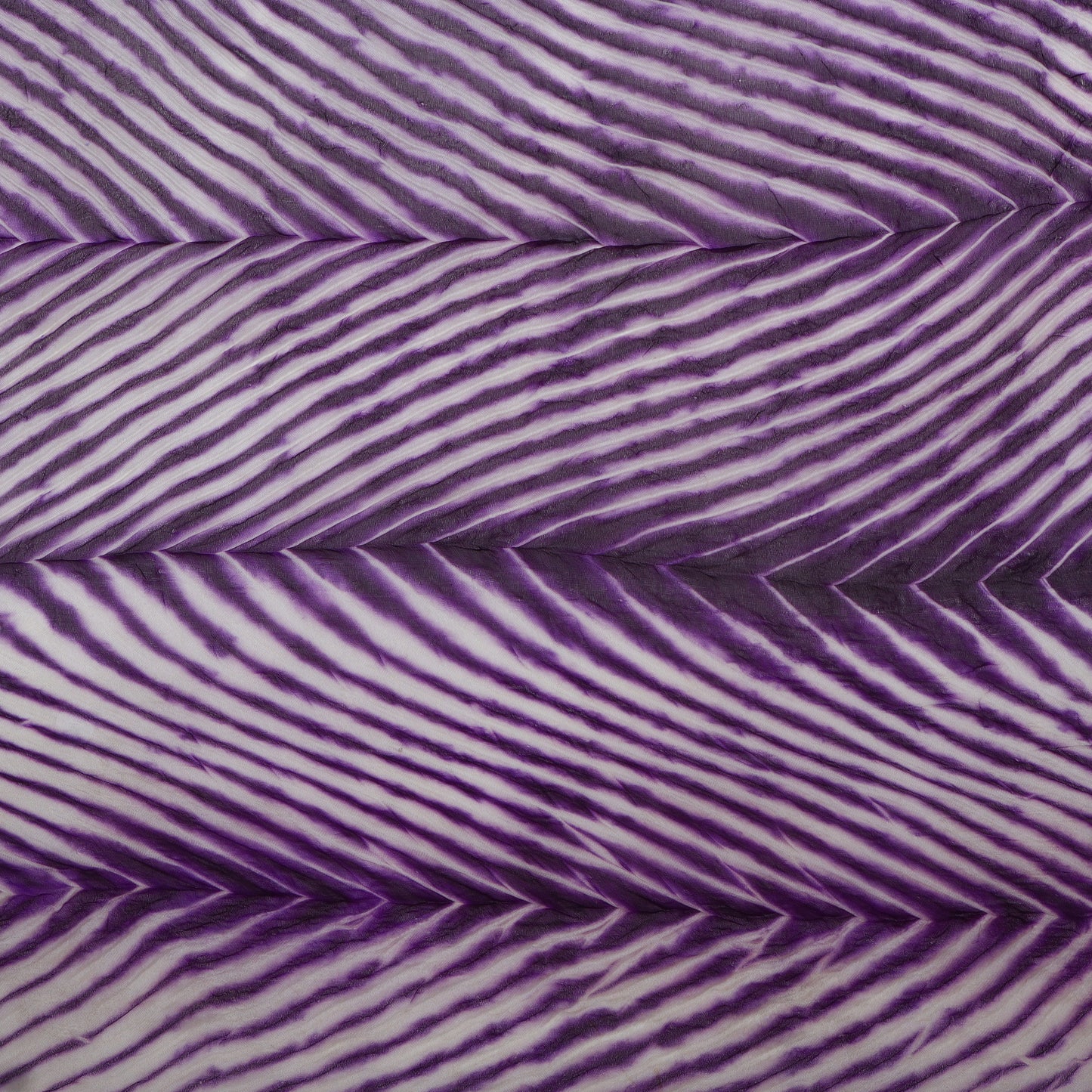 Close-up of purple and white striped fabric pattern