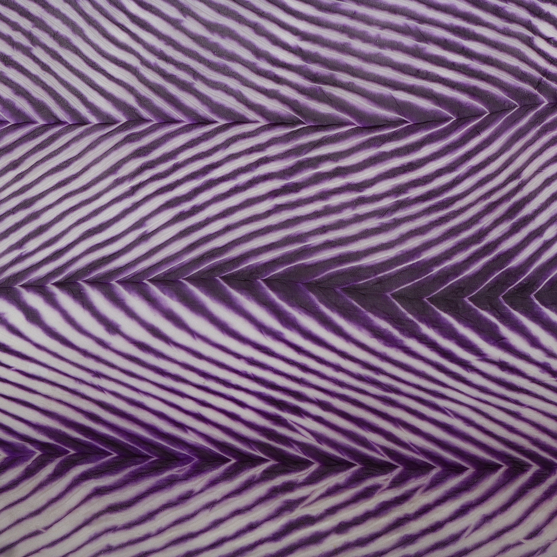 Close-up of purple and white striped fabric pattern