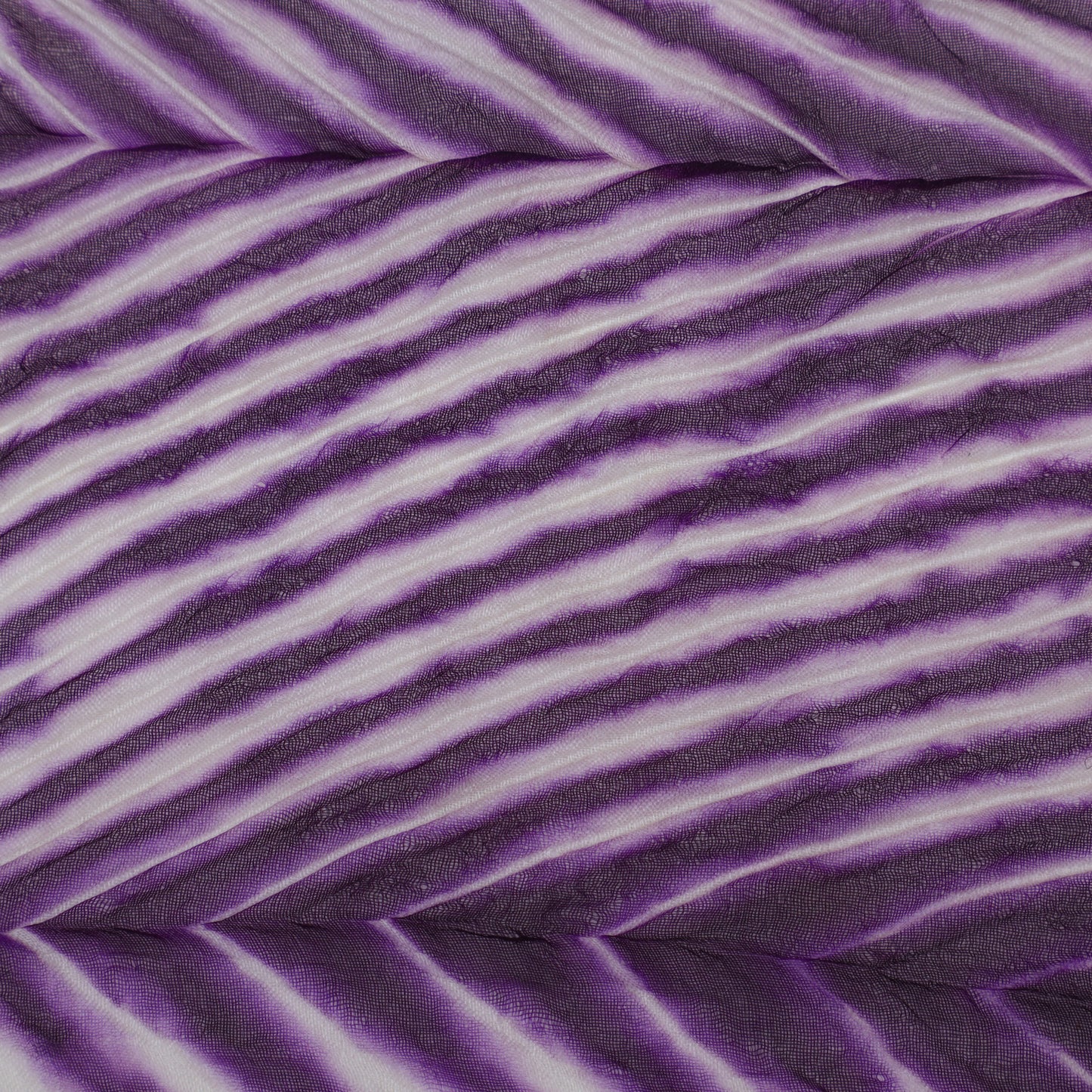 Purple fabric with wavy pattern