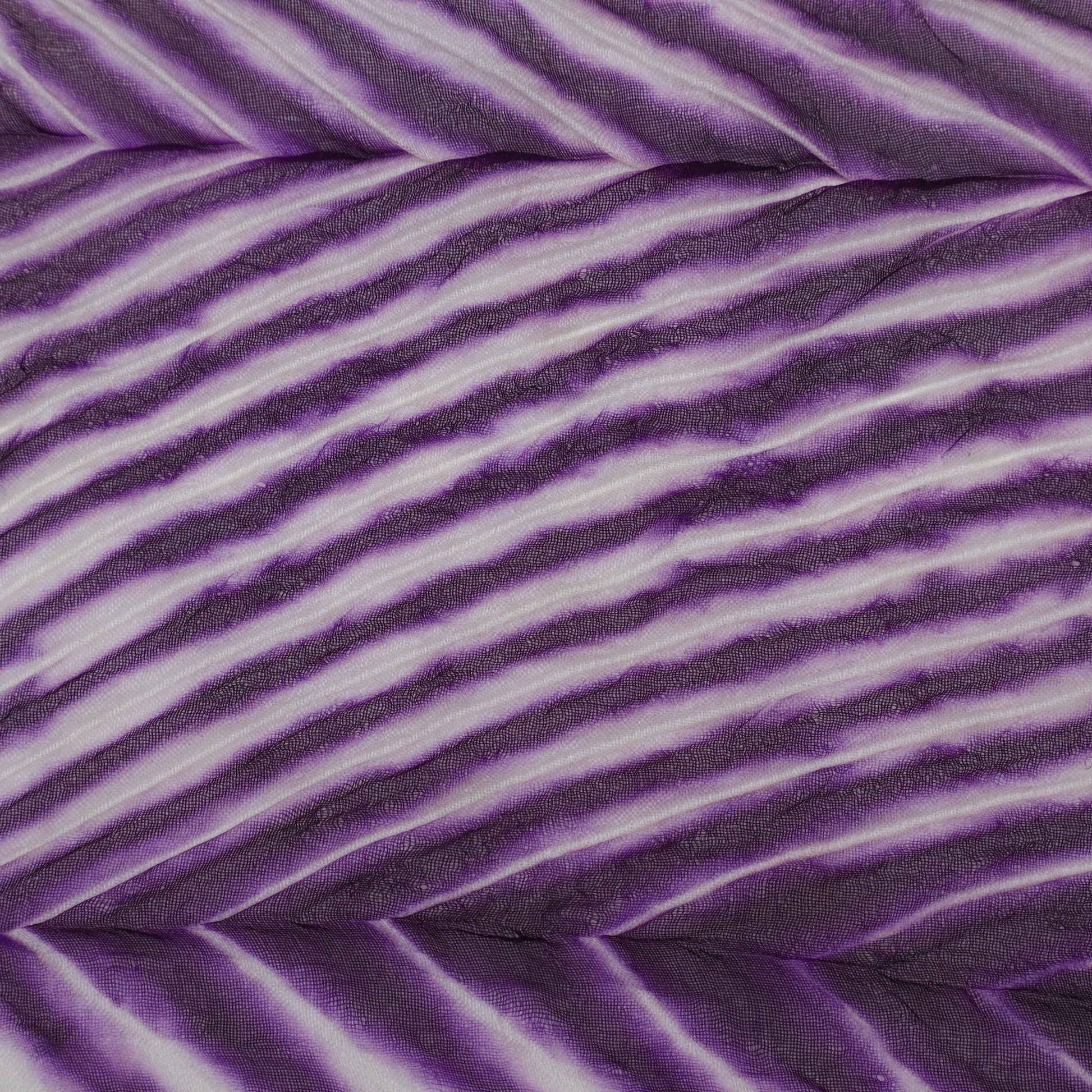 Purple fabric with wavy pattern