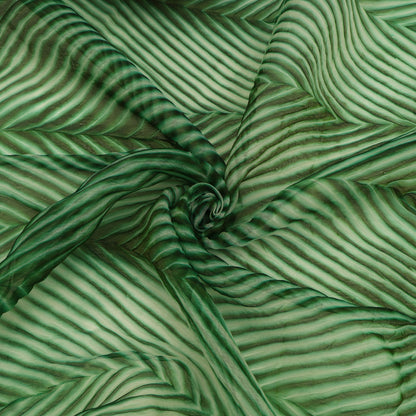 Green fabric with wavy pattern, close-up view