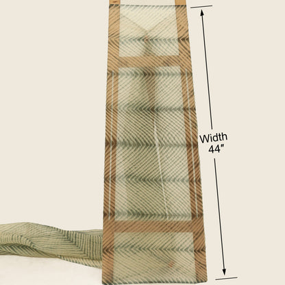 Plaid ribbon with measurements on a beige background
