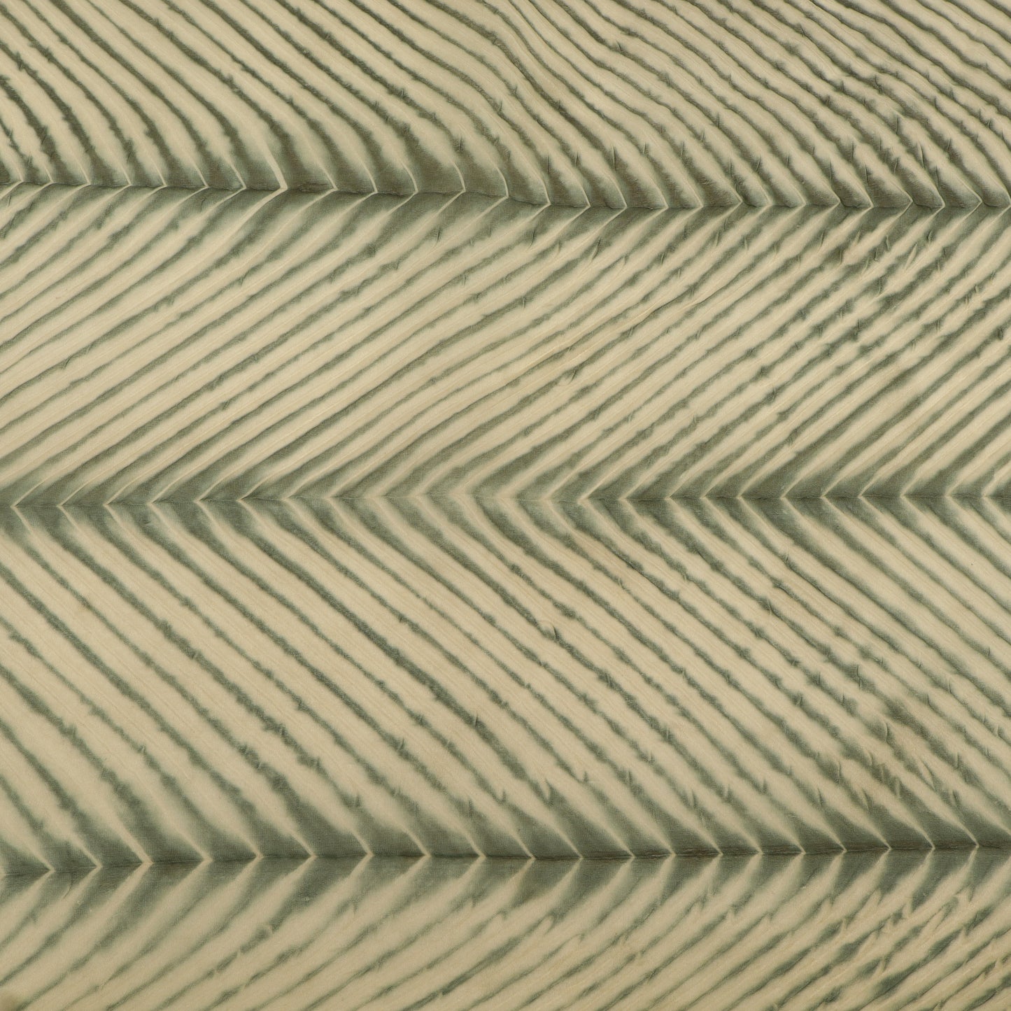 Close-up of sand dune with wavy pattern