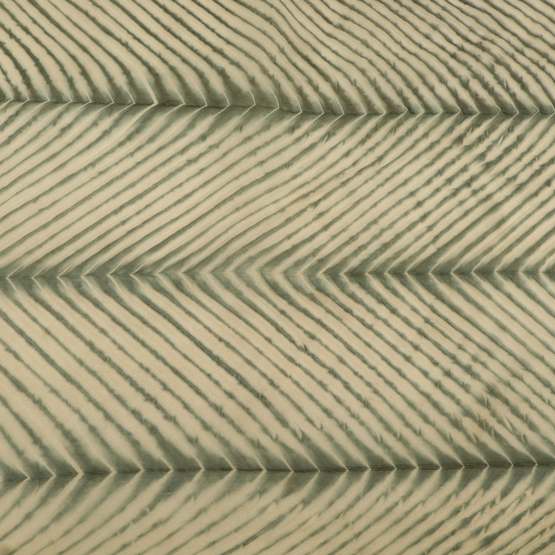 Close-up of sand dune with wavy pattern