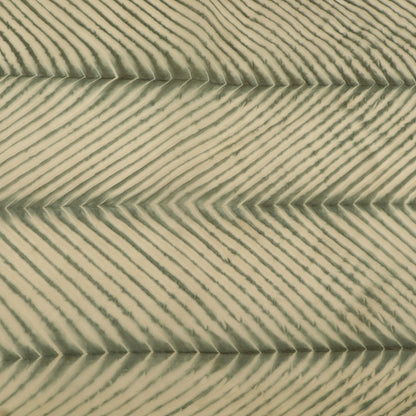 Close-up of sand dune with wavy pattern