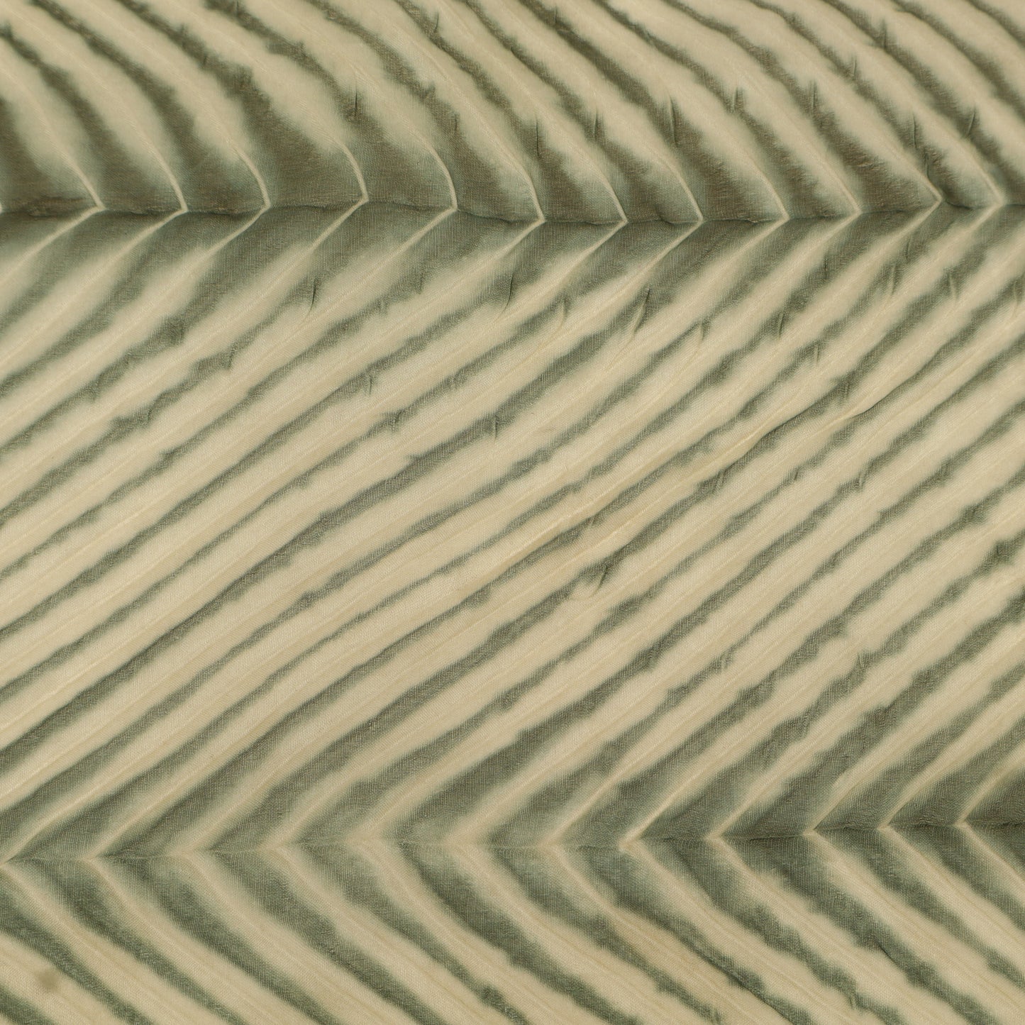 Close-up of sand dunes with a patterned texture