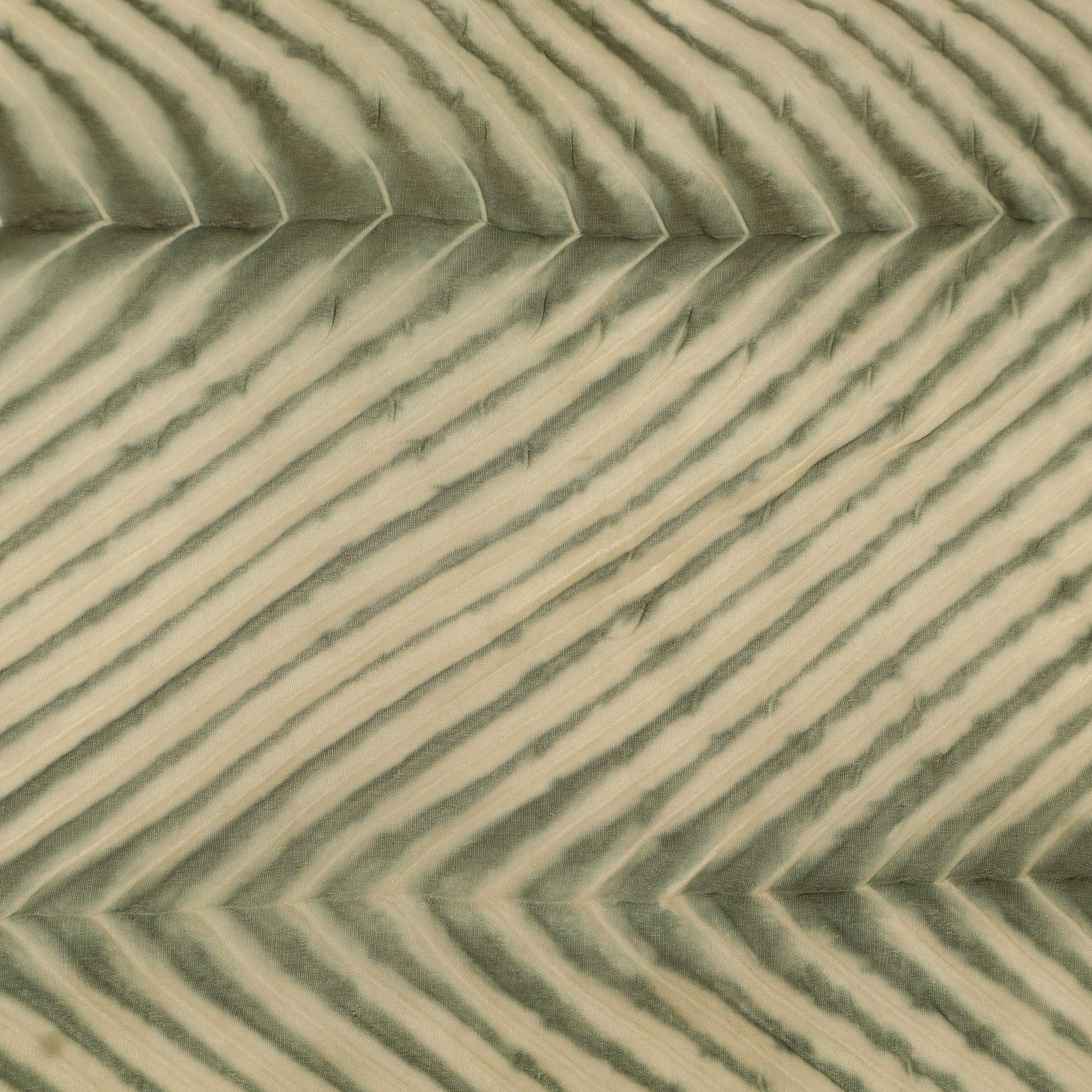 Close-up of sand dunes with a patterned texture