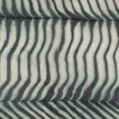 Fabric with wavy gray and white pattern