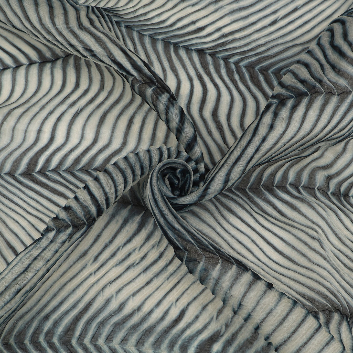 Textured fabric with wavy pattern in gray and white