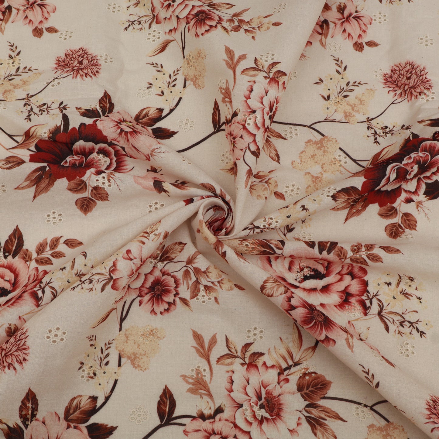 Floral fabric pattern with red and pink flowers on a beige background