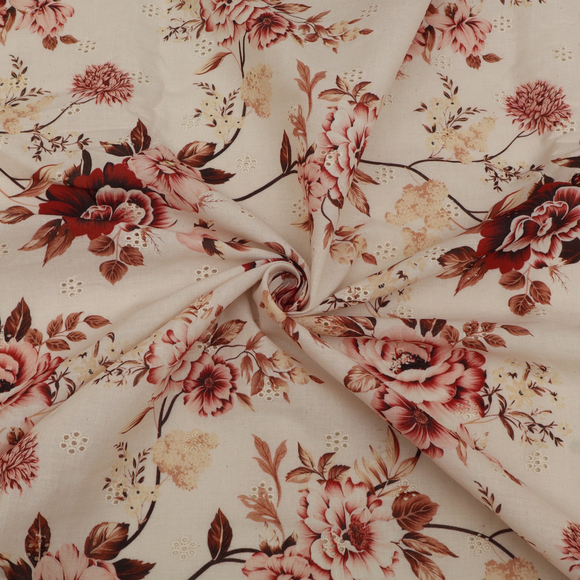 Floral fabric pattern with red and pink flowers on a beige background