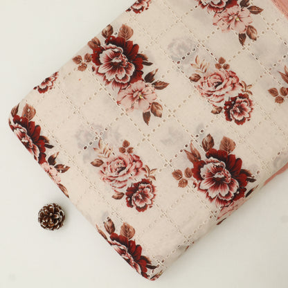 Floral-patterned fabric with a small pine cone on a white background