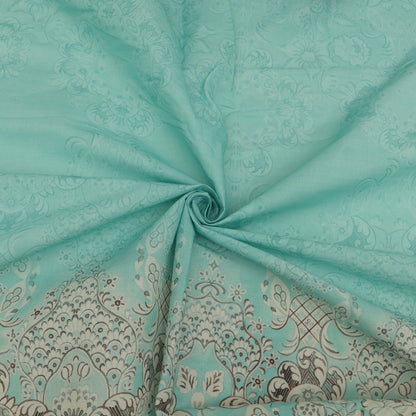Turquoise fabric with intricate paisley pattern