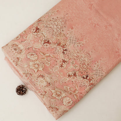 Pink fabric with floral pattern on a white background