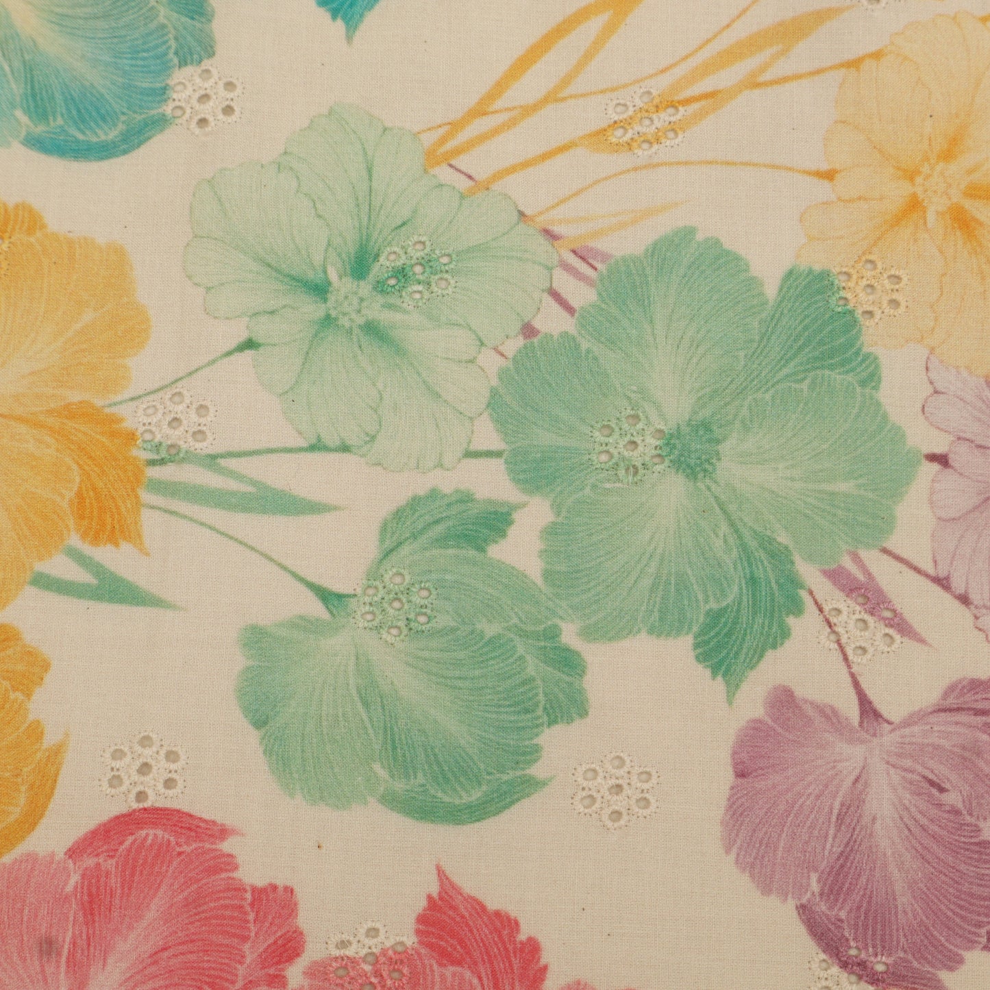 Floral pattern with green, yellow, and pink flowers on a beige background