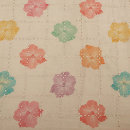 Patterned fabric with colorful flowers on a beige background