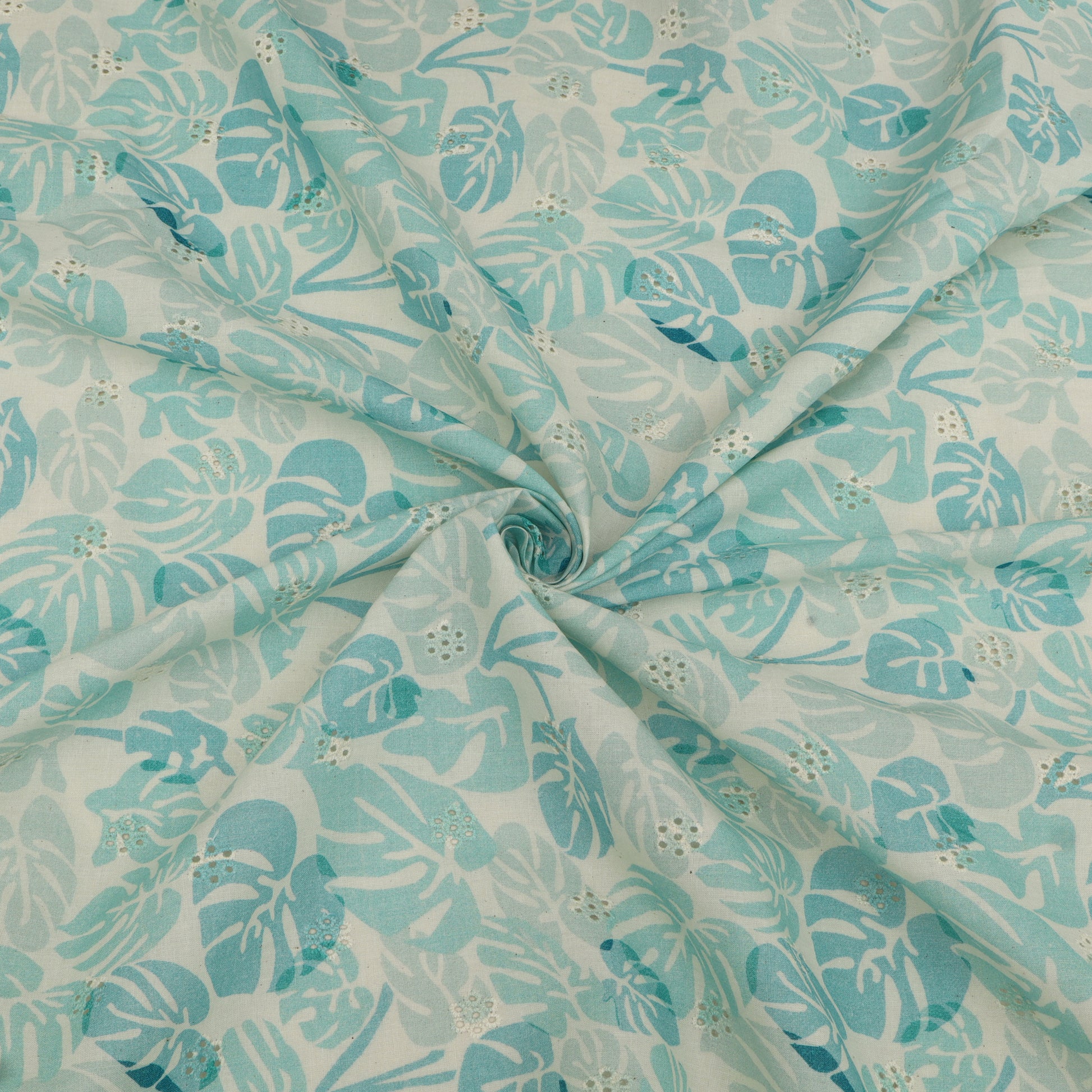 Fabric with a blue and white leaf pattern