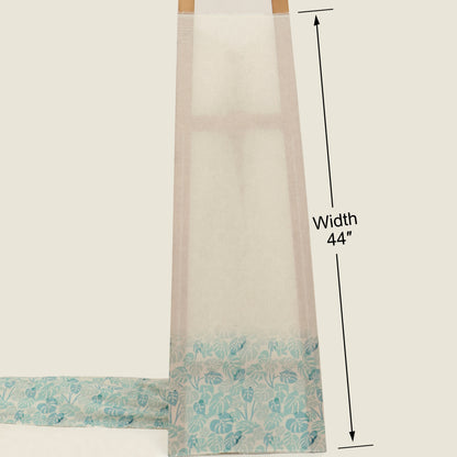 Fabric with floral pattern and measurement details on a plain background