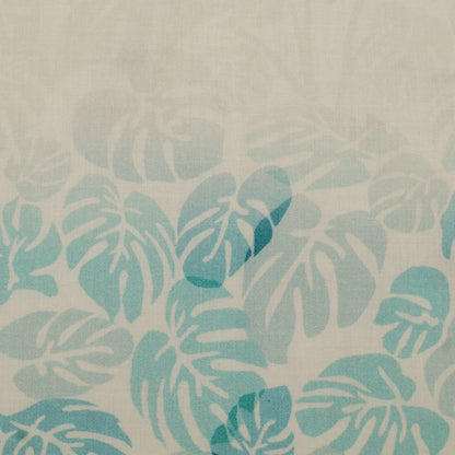 Pattern of blue leaves on a beige background