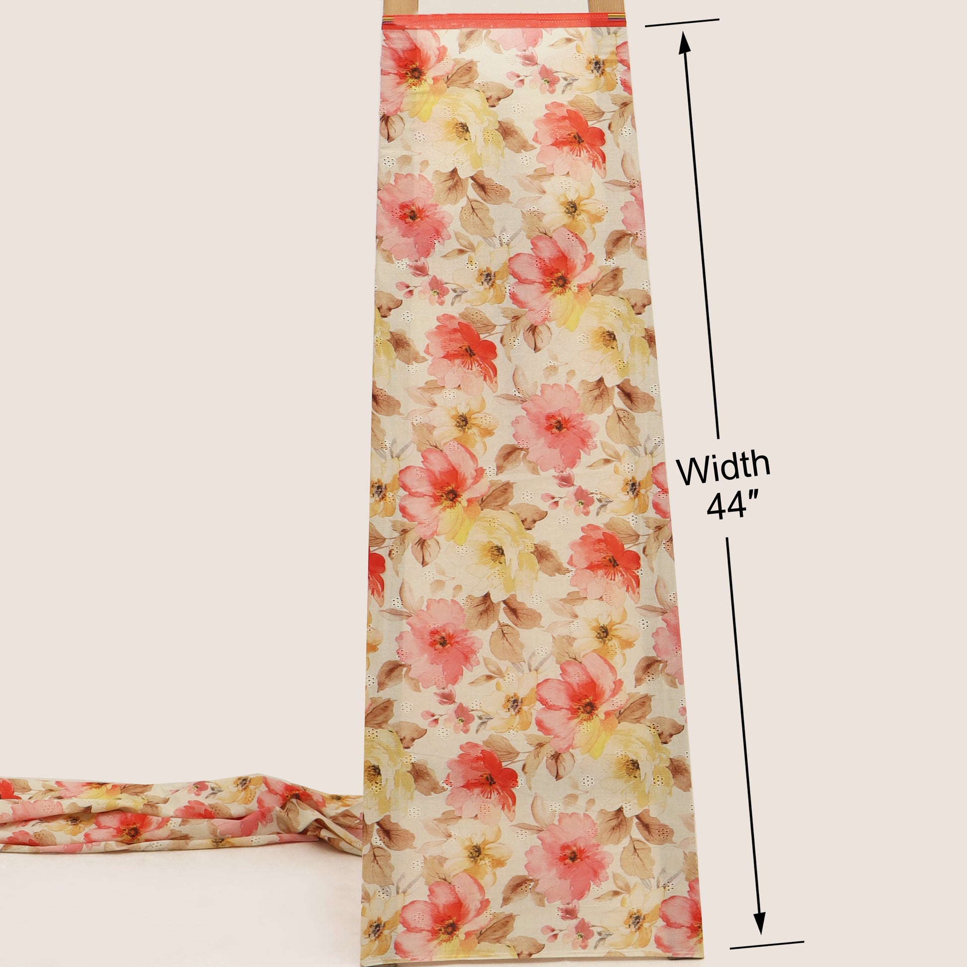 Floral fabric with a width measurement of 44 inches on a white background