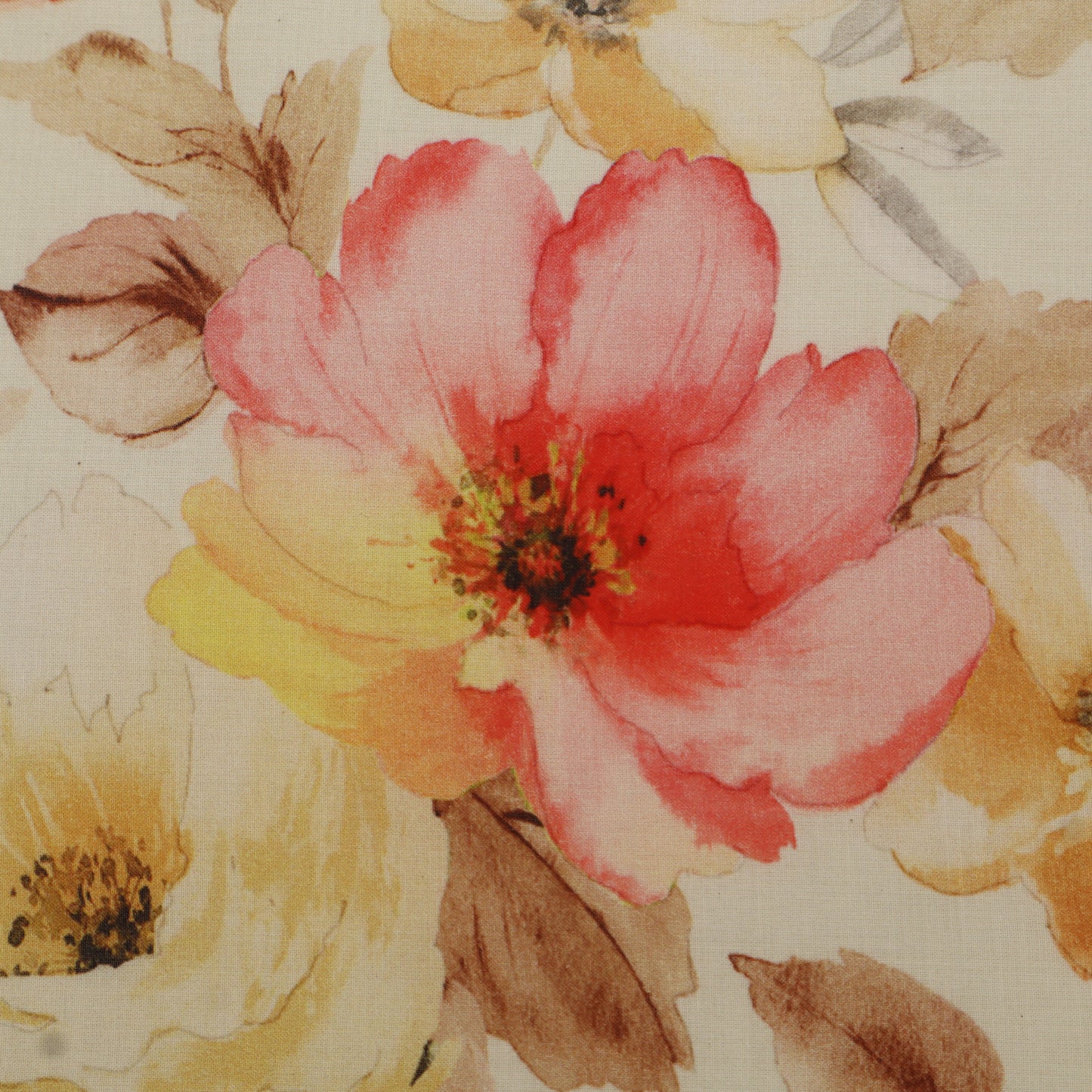Close-up of a pink flower with a yellow center on a floral patterned background