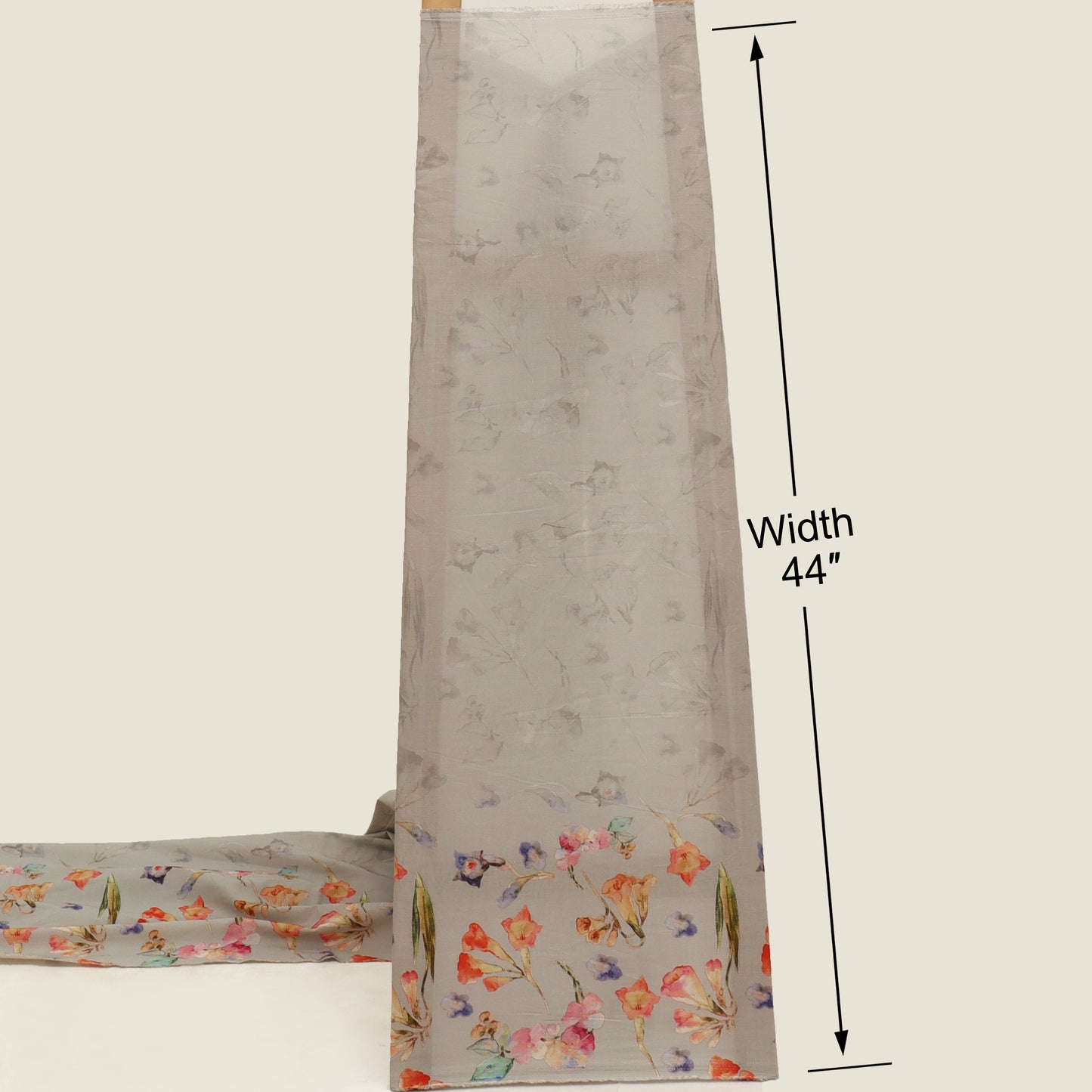 Floral patterned fabric with a measurement label indicating width 44 inches on a plain background.