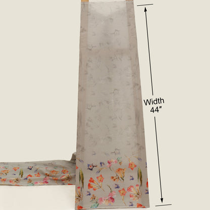 Floral patterned fabric with a measurement label indicating width 44 inches on a plain background.