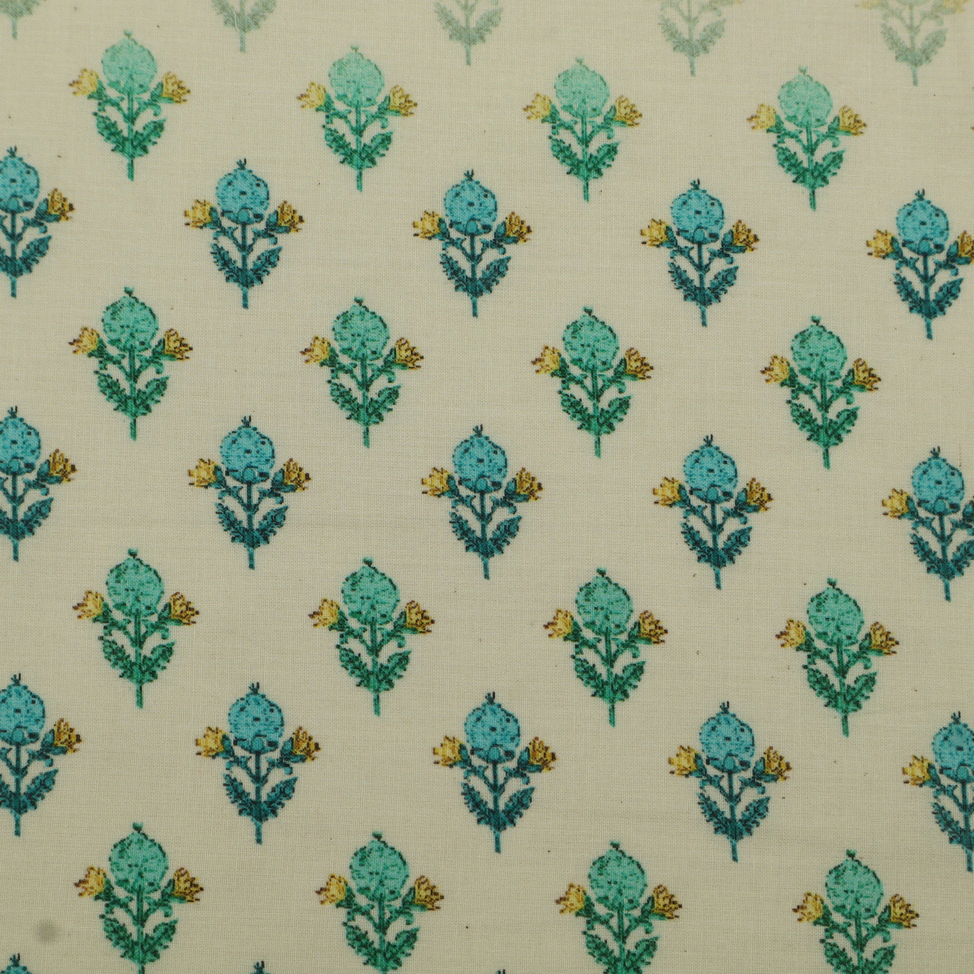 Patterned fabric with teal floral design on a beige background