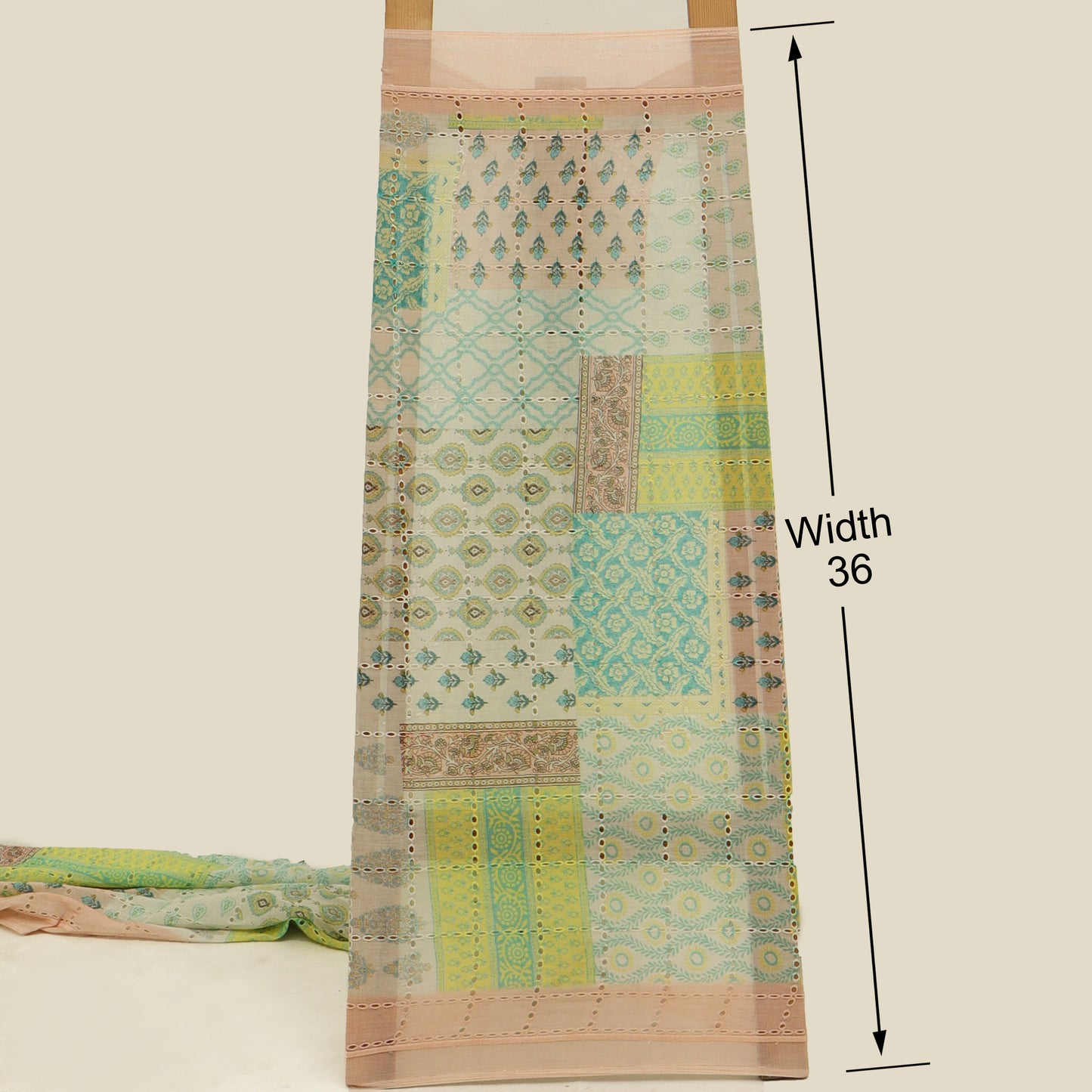 Patterned fabric with measurements on a beige background