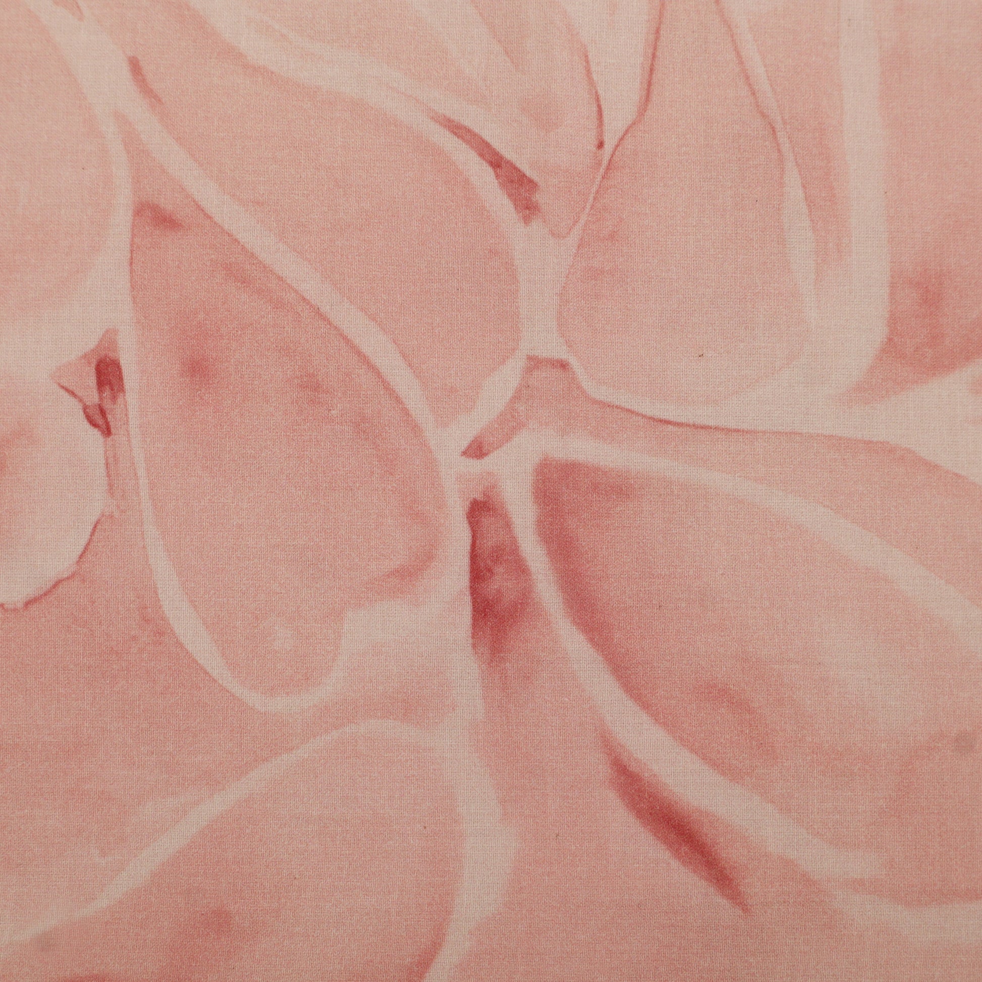 Close-up of pink fabric with leaf pattern