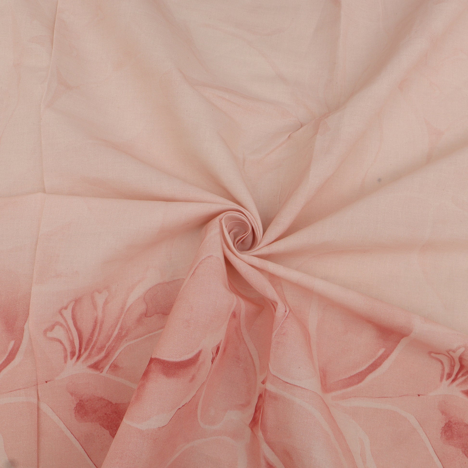 Close-up of pink fabric with floral patterns