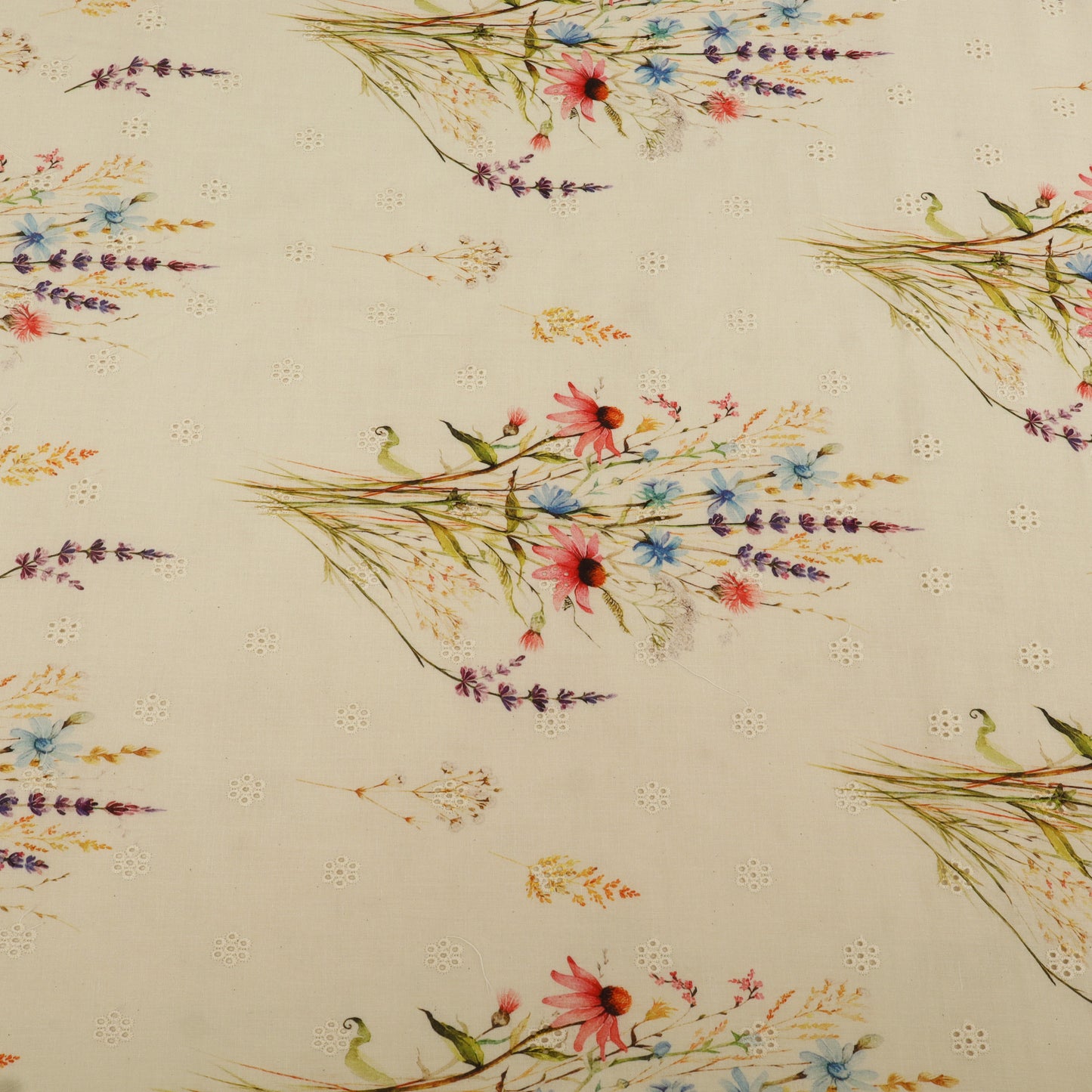 Pattern of colorful flowers and leaves on a beige background