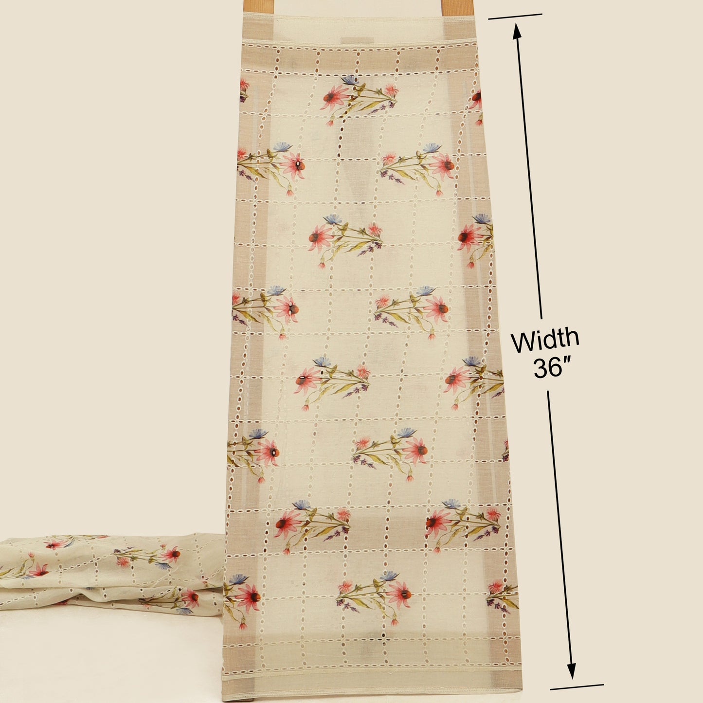 Floral patterned fabric with measurement details on a beige background
