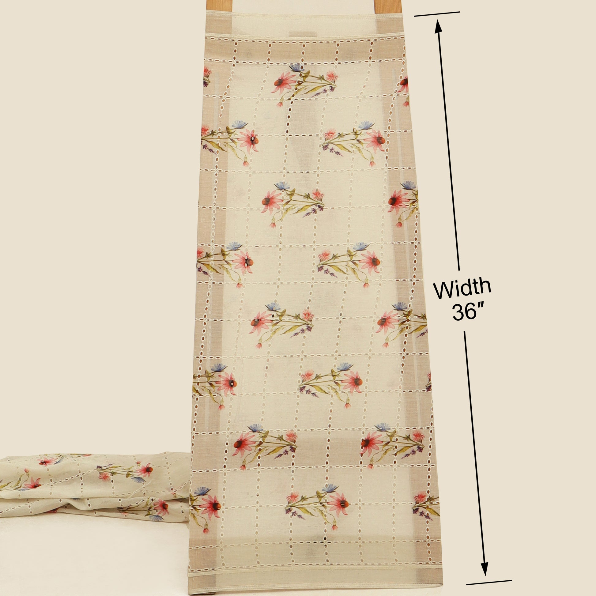 Floral patterned fabric with measurement details on a beige background