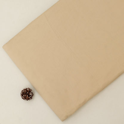 Beige fabric with a pine cone on a light beige background