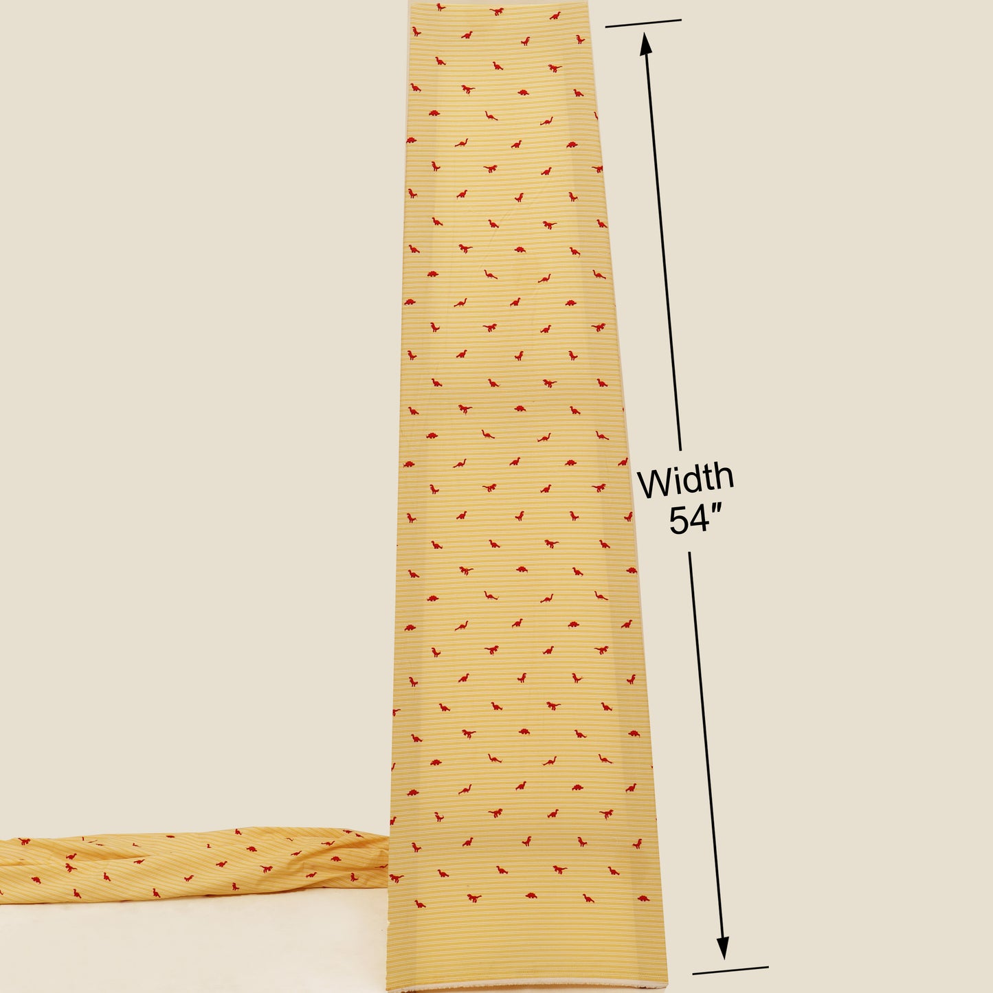 Yellow fabric with red pattern and measurement label on a beige background