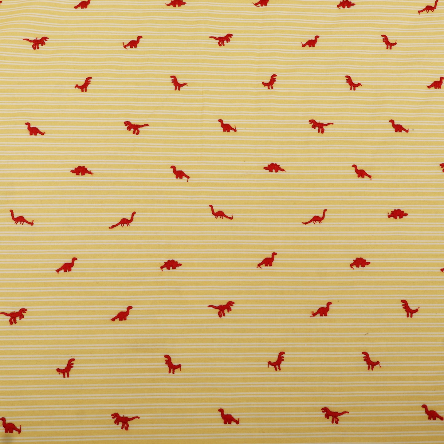 Red dinosaur pattern on a yellow striped background