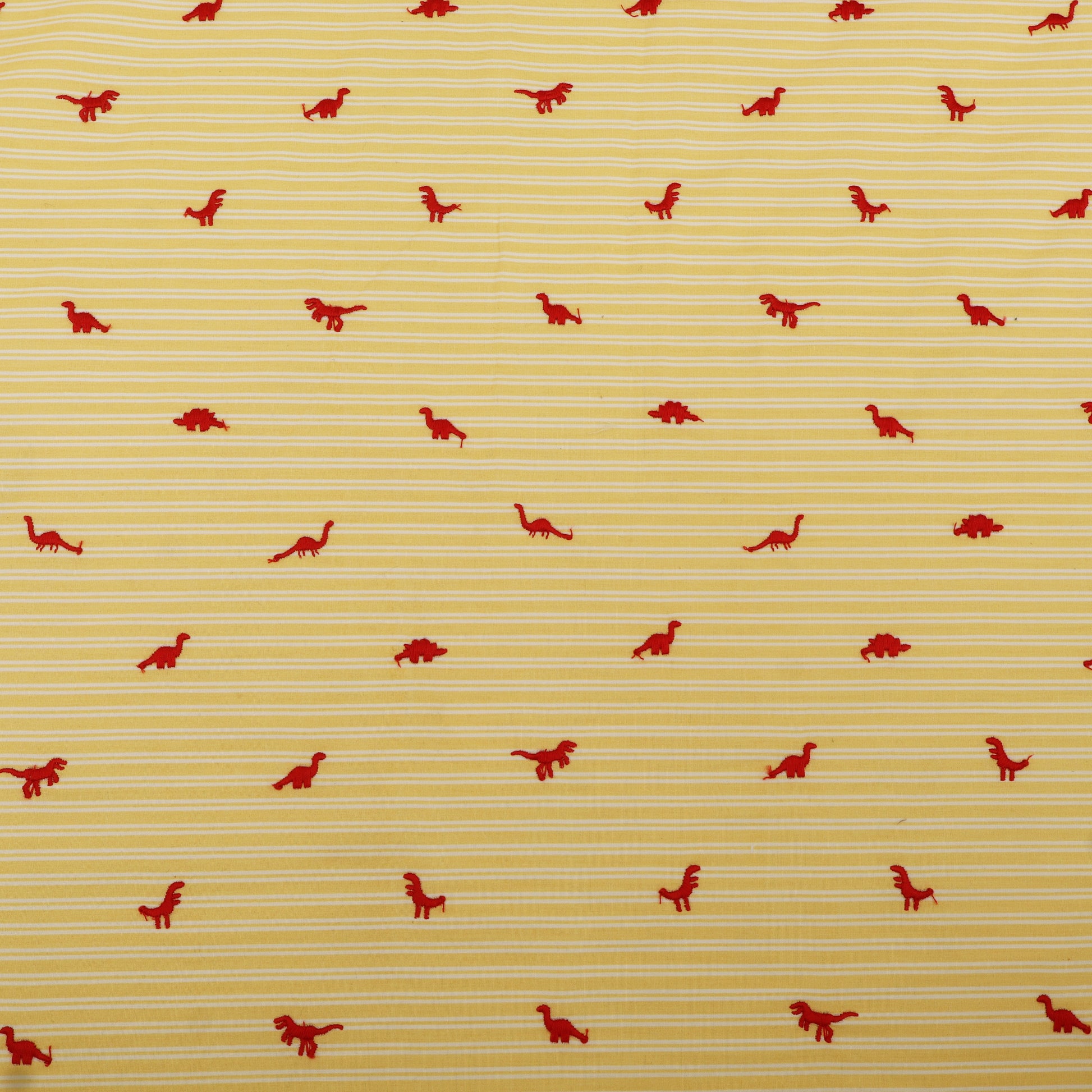 Red dinosaur pattern on a yellow striped background