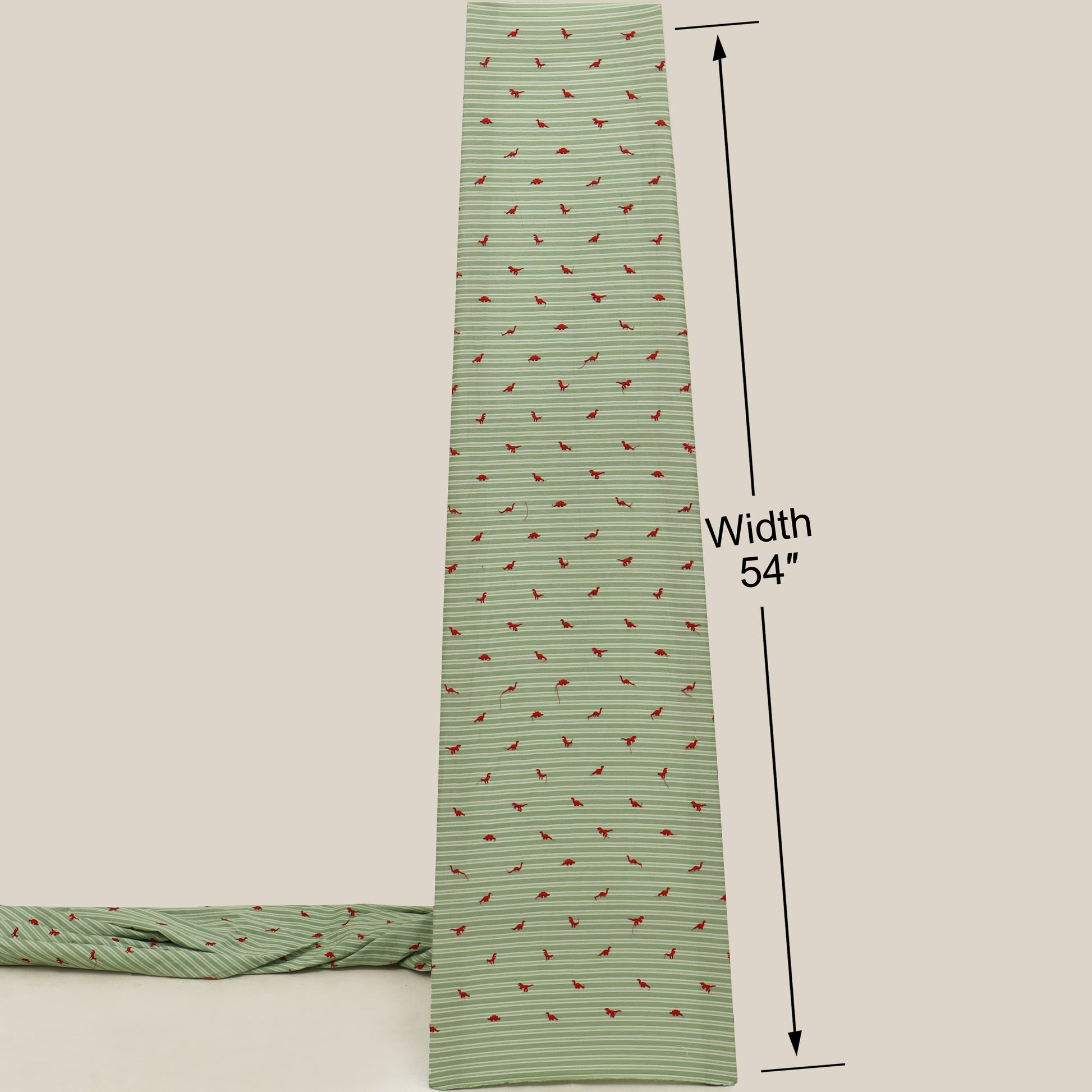 Green tie with red pattern and measurement label on a beige background